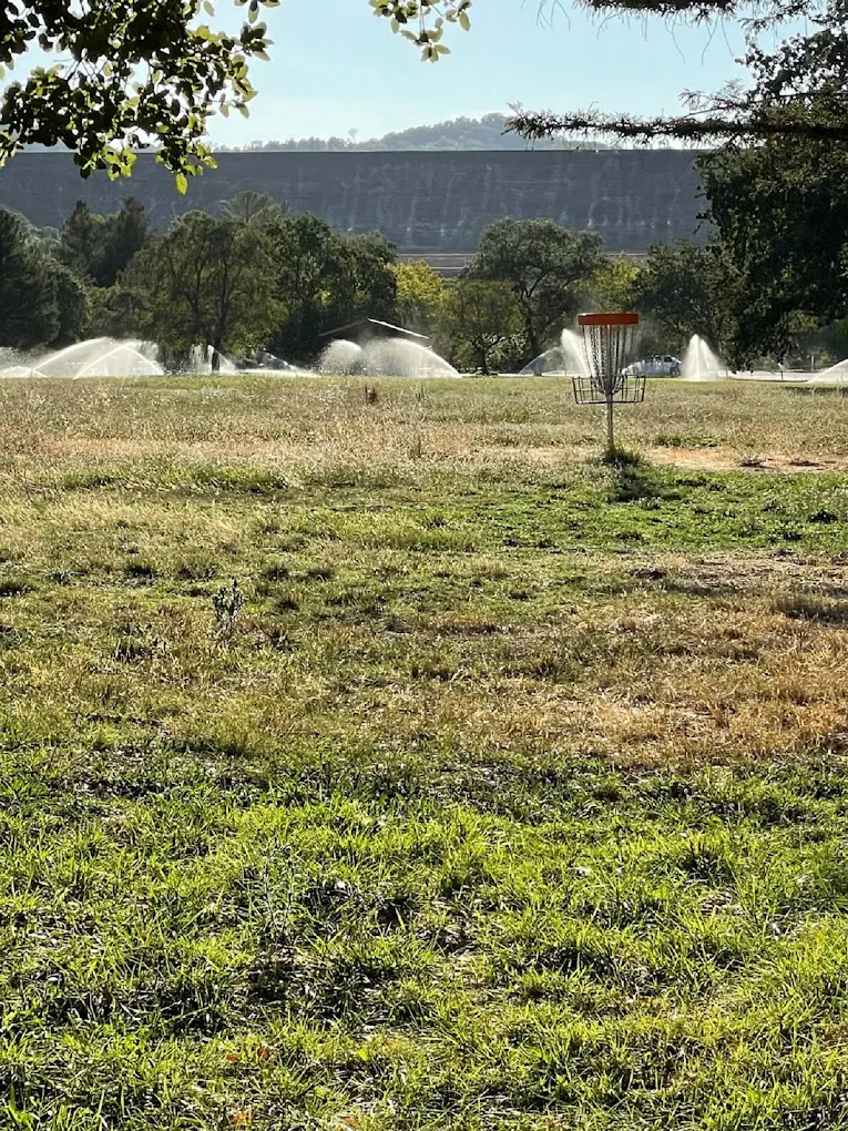 Disc golfer throwing at Lake Sonoma